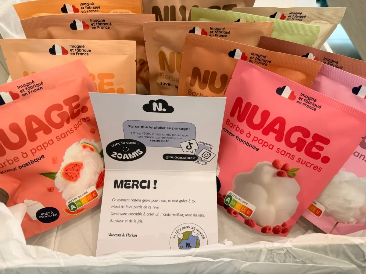 Image de plusieurs sachets de barbe à papa sans sucres et d'une carte de remerciement.